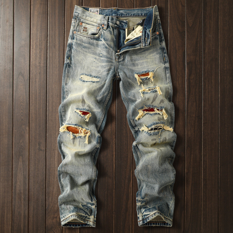 Street Fashion High End - Męskie jeansy z przetarciami w stylu